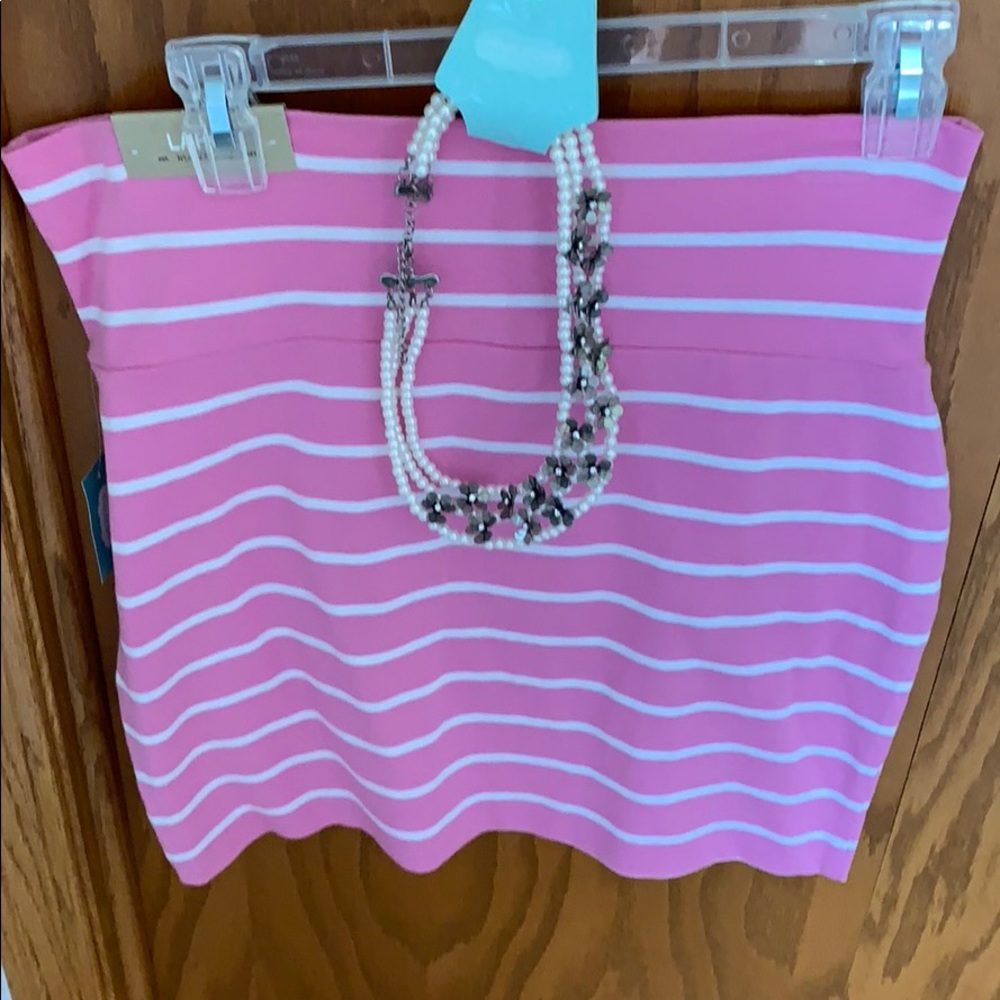 Maurice’s skirt and necklace